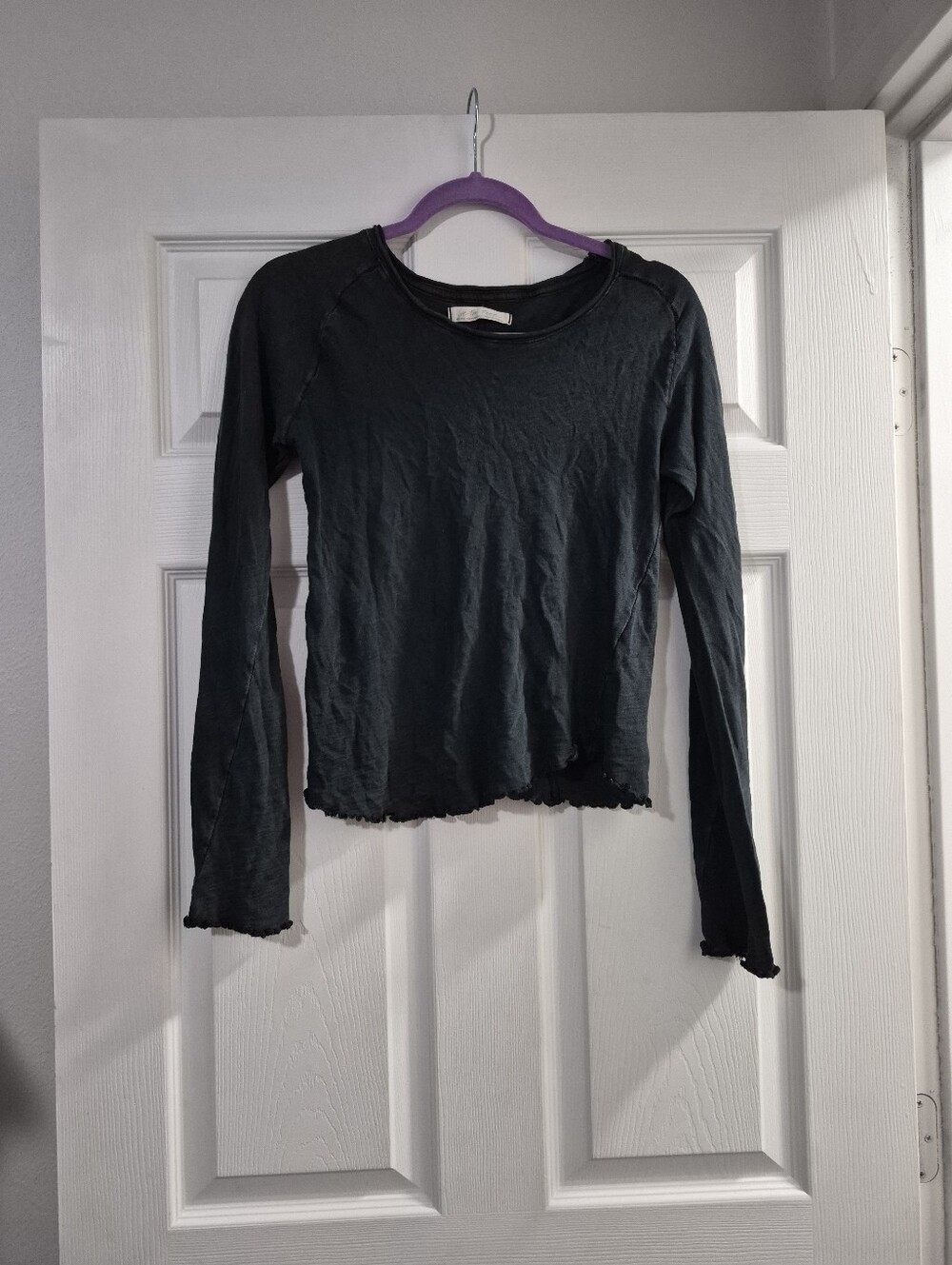 We The Free Black Long Sleeve Lettuce-Edge Crewneck Top